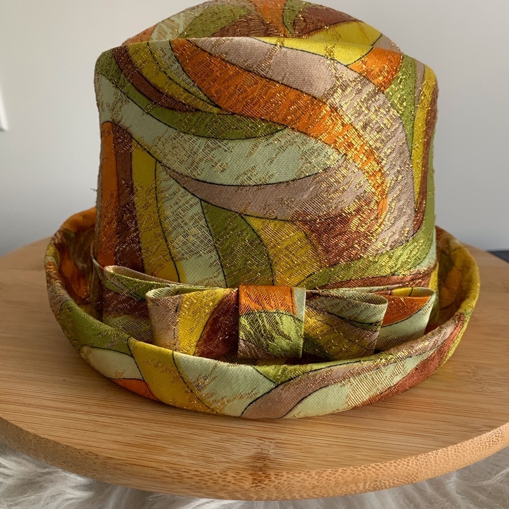 Michele Orange and Green Accent Hat with Retro Swirl Design